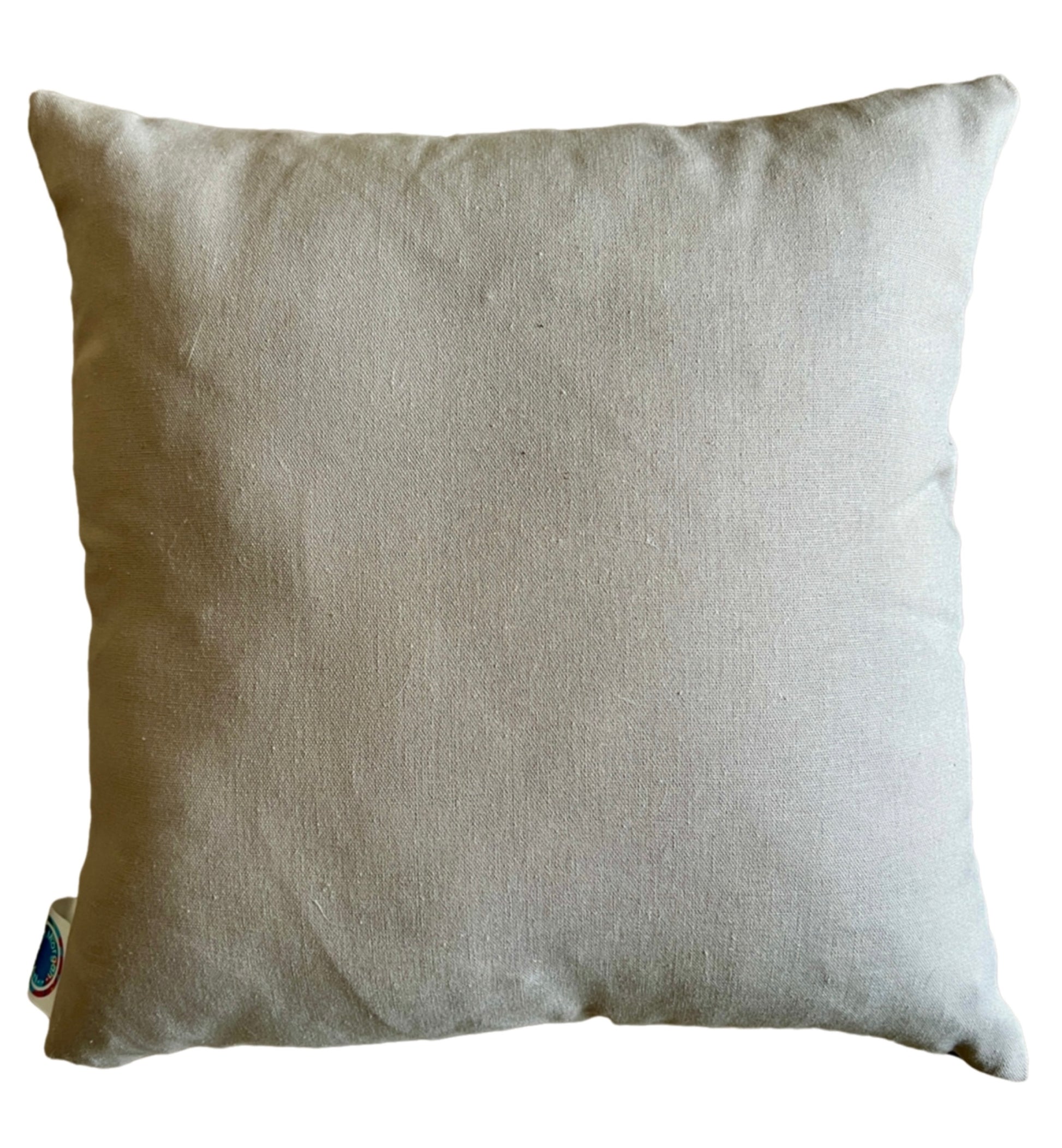 The back of the Sunset cushion by Beth Morgan Art. This consists of a plain beige fabric.